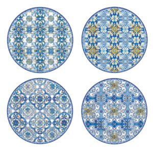 cuatro platos de postre de porcelana de color azul