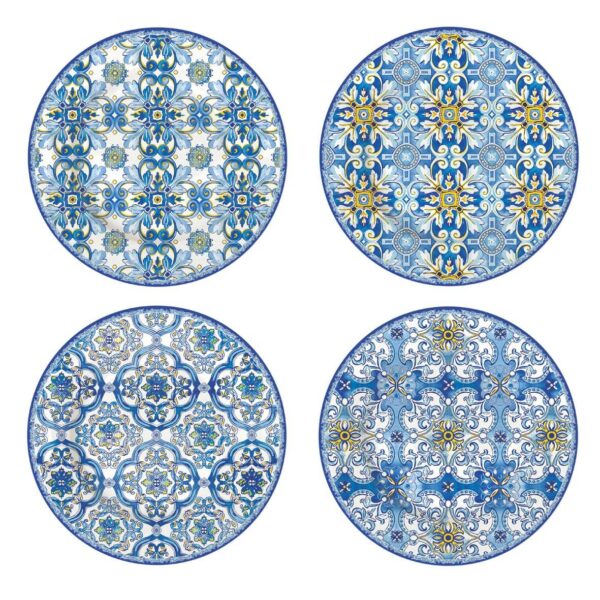 cuatro platos de postre de porcelana de color azul