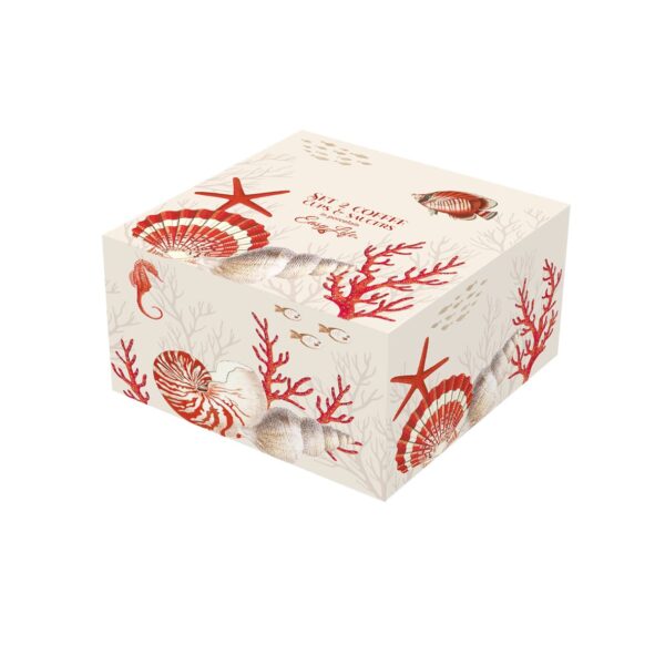 caja cerrada con un set de dos tazas de café con motivos marinos rojos