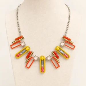 collar de esmalte estilo art deco de color naranja y amarillo